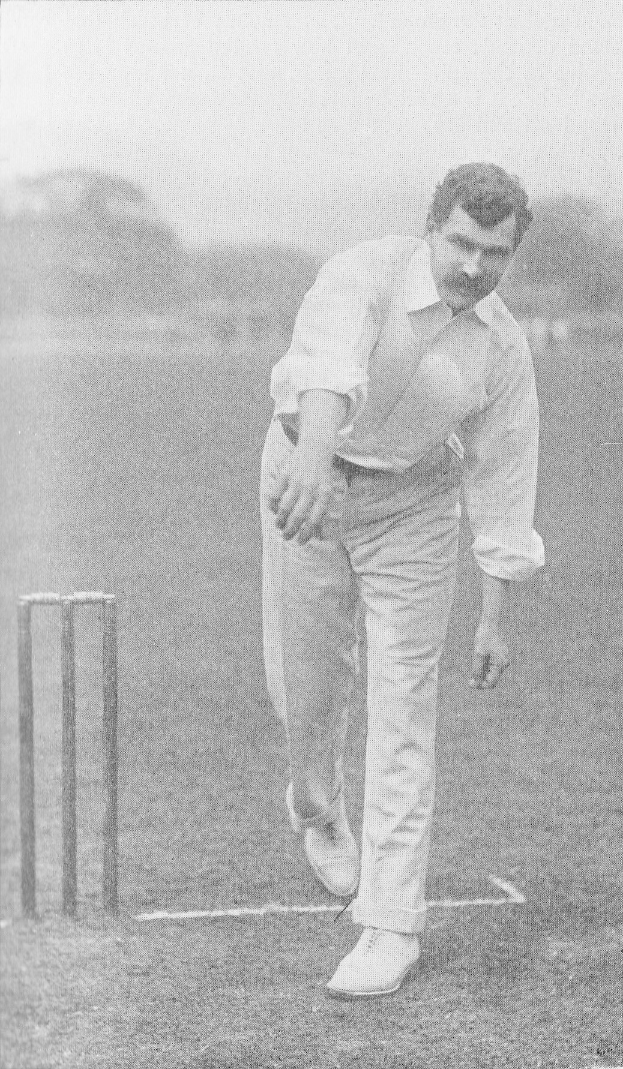 Ein Mann in weißem Hemd und Hose, der Cricket spielt, mit Wickets auf dem Boden, Bäumen und Himmel im Hintergrund, mit dem Text "Cricket-Spieler des Jahres" unten.
