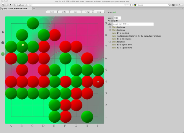 Ein Computerbildschirm zeigt ein Go-Spiel mit einem Gitter aus roten und grünen Kreisen.